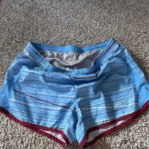 Nikes Womans Tempo Running Shorts size small blue/muli colored